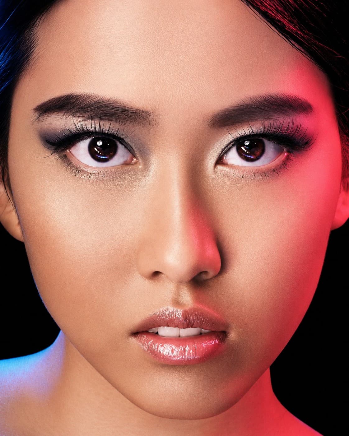 Close beauty portrait with red and blue gel lighting photographed at VibeShack Studios