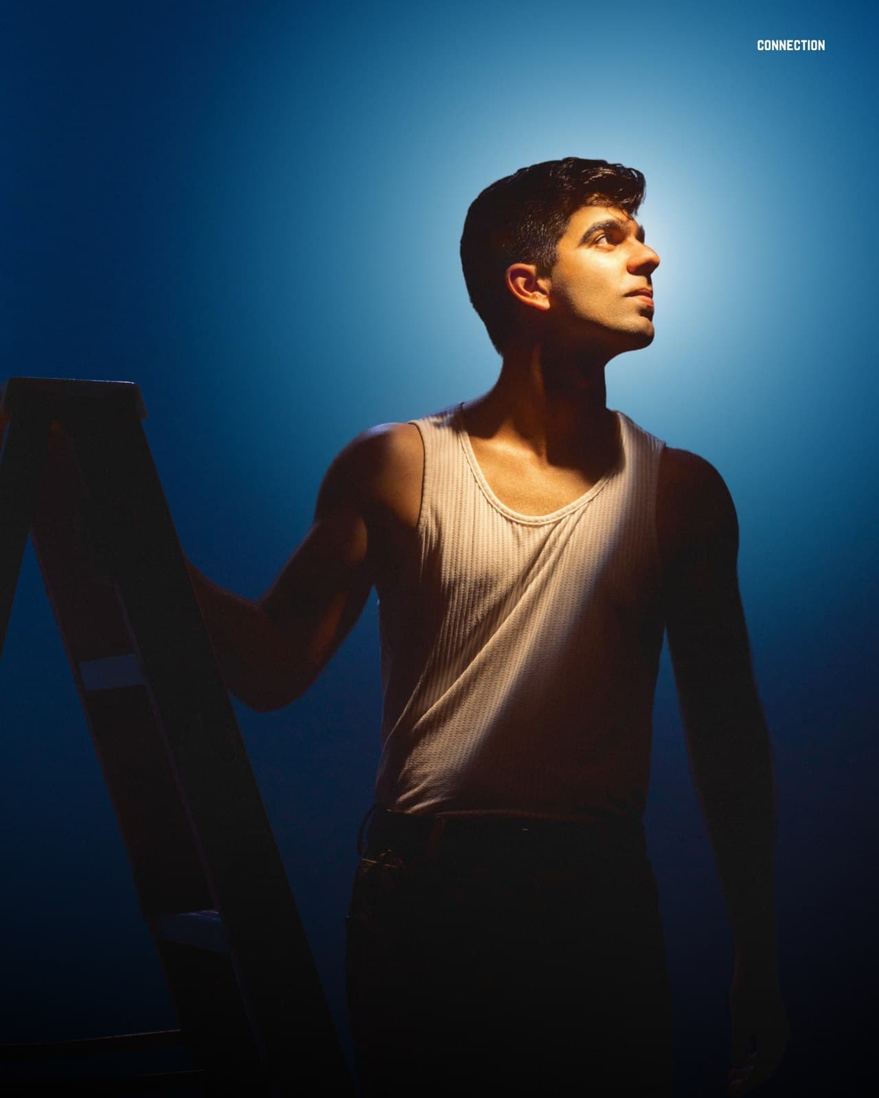 Blue spotlight portrait photographed at VibeShack Studios